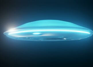 glowing with blue light flying saucer